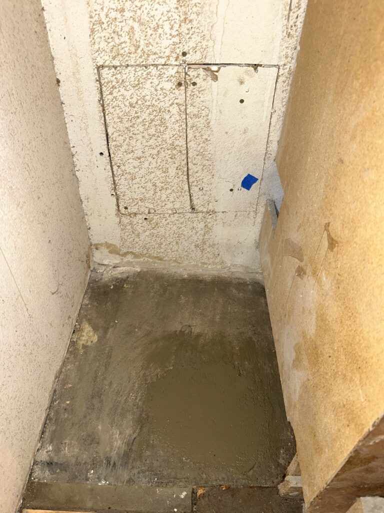 Underground water line leak beneath concrete slab causing moisture and foundation damage